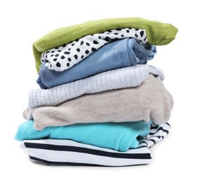 Photo of Stack of used clothes isolated on white