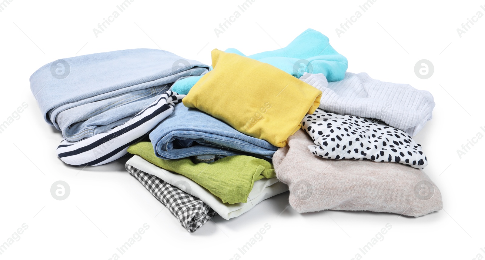 Photo of Pile of different used clothes isolated on white