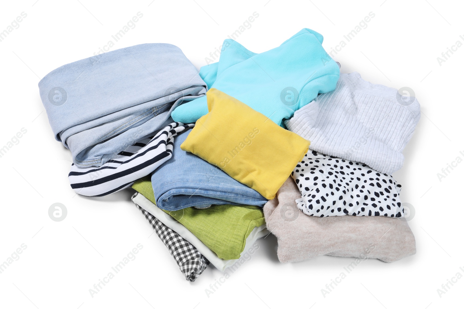 Photo of Pile of different used clothes isolated on white