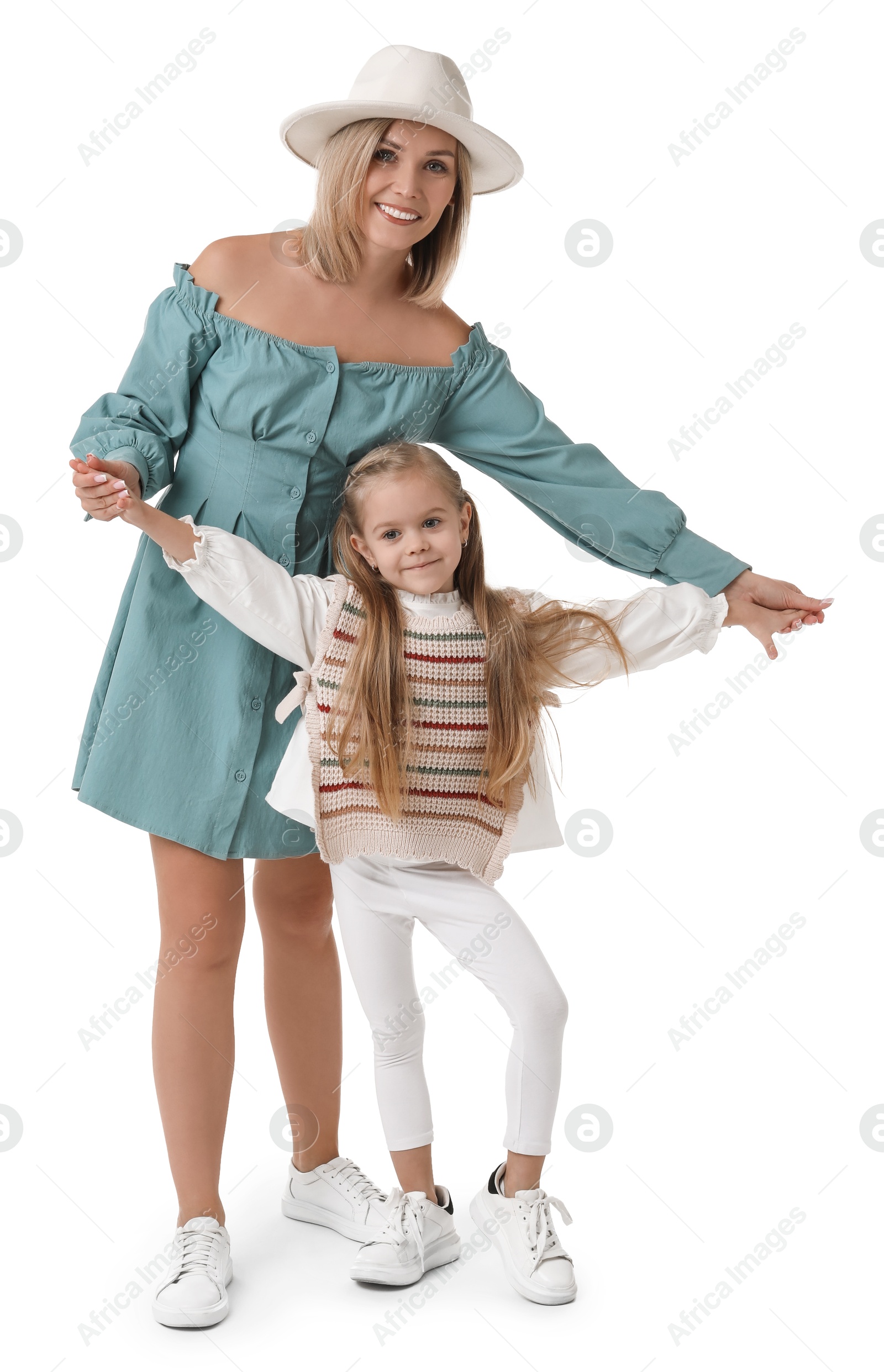 Photo of Happy mother with her cute little daughter on white background