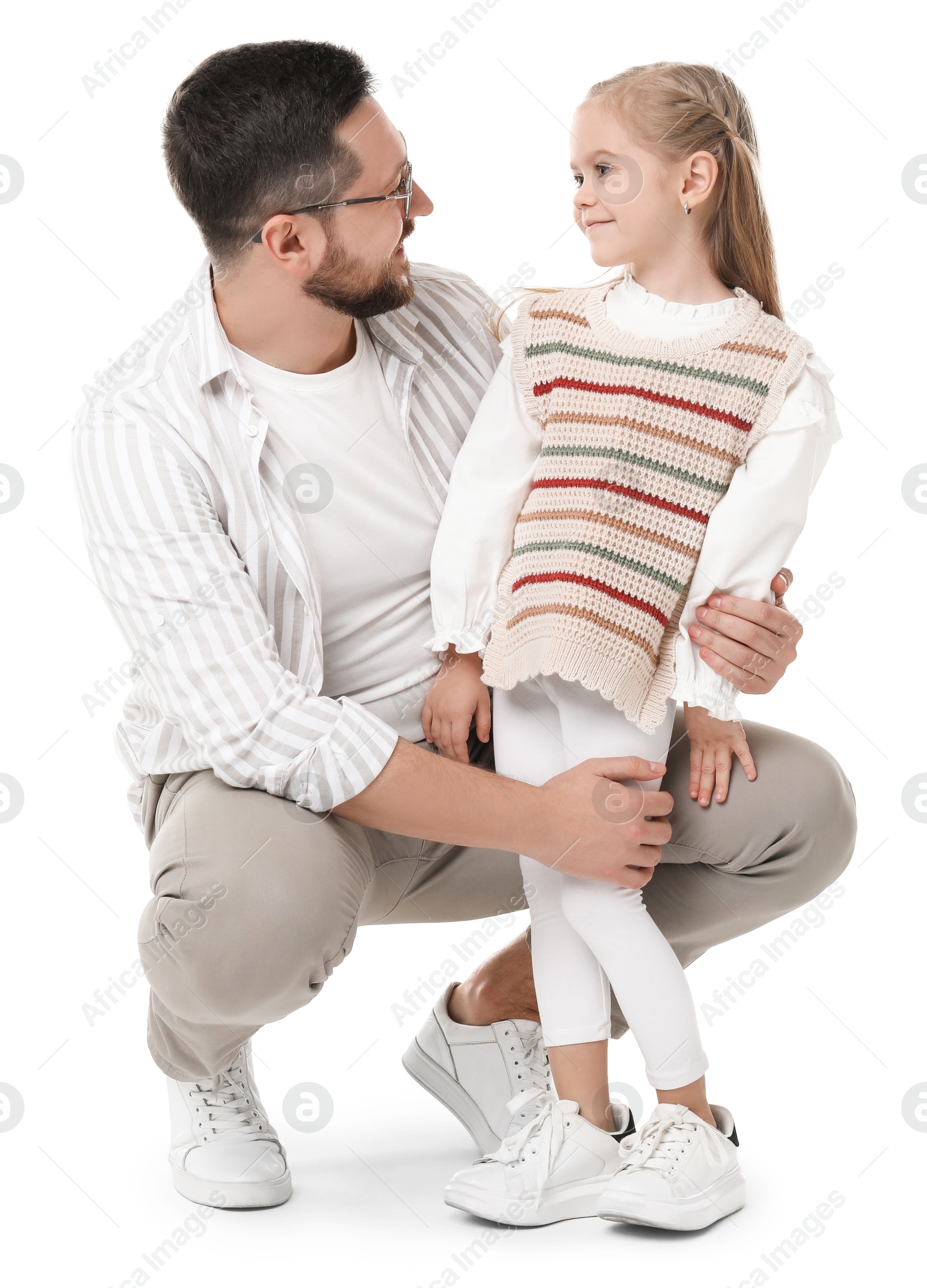 Photo of Happy father with his cute little daughter on white background