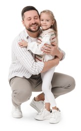 Photo of Happy father with his cute little daughter on white background