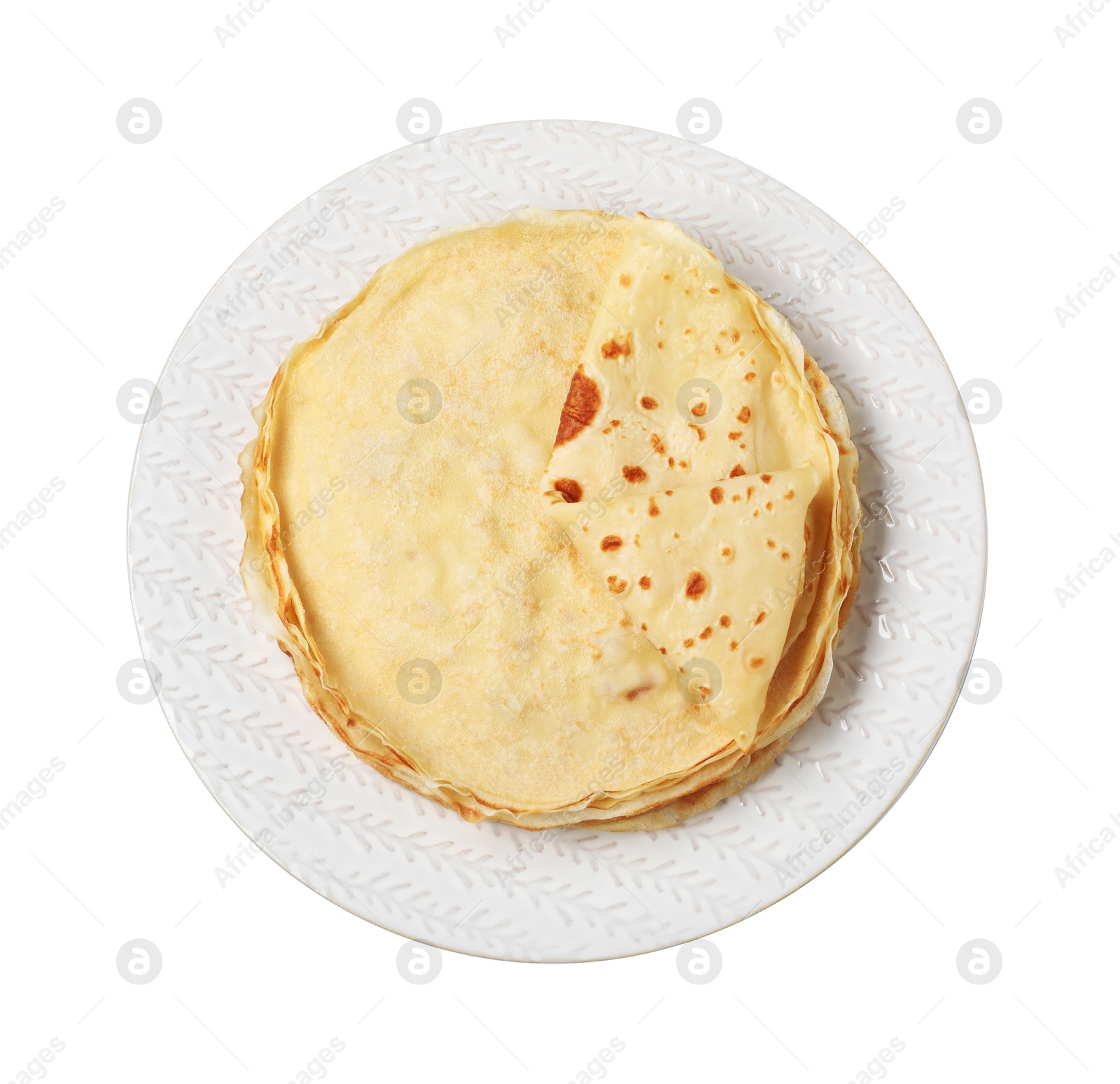 Photo of Stack of delicious crepes isolated on white, top view