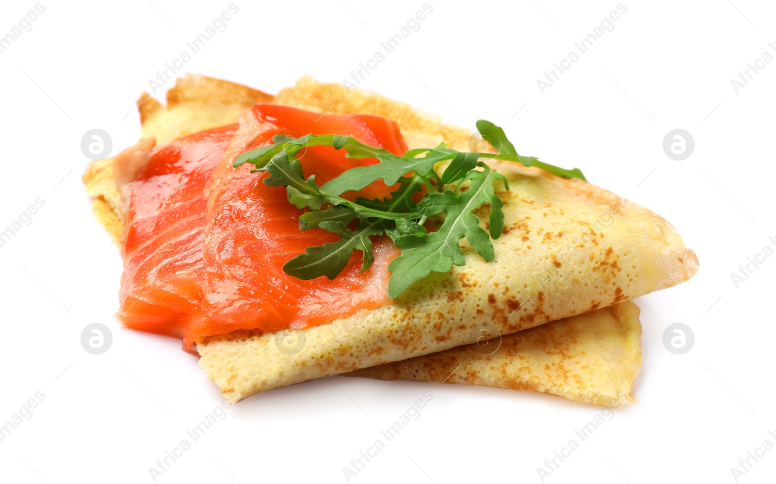 Photo of Delicious crepes with salmon and arugula isolated on white