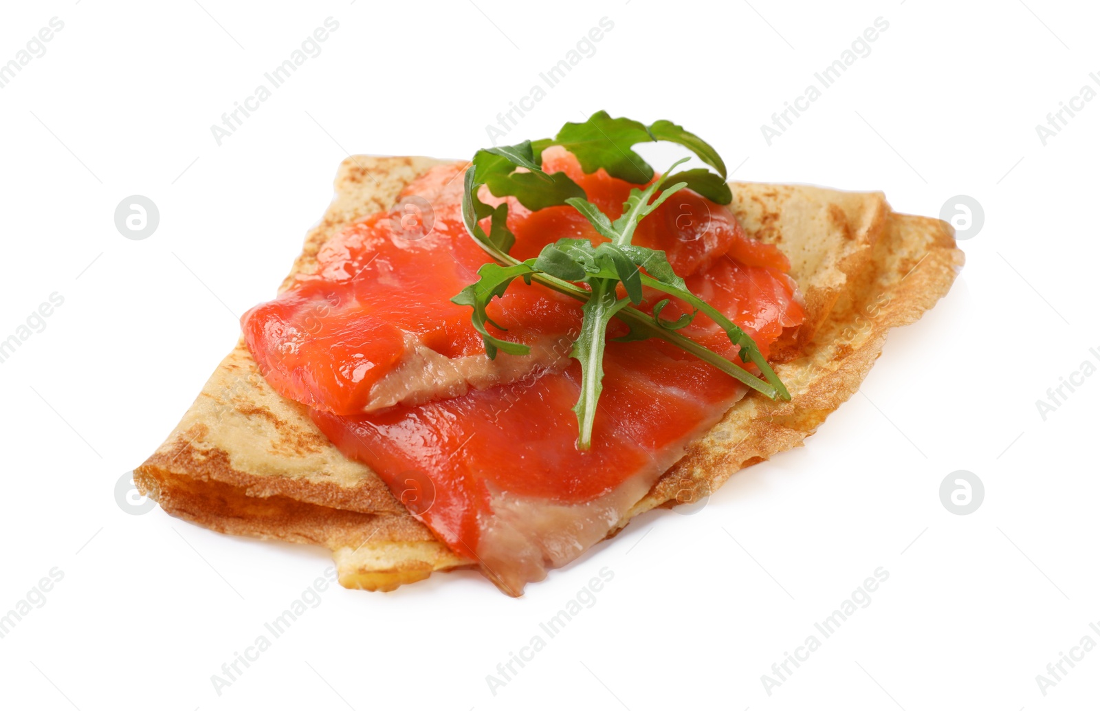 Photo of Delicious crepe with salmon and arugula isolated on white