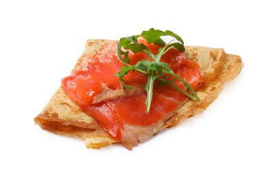 Photo of Delicious crepe with salmon and arugula isolated on white