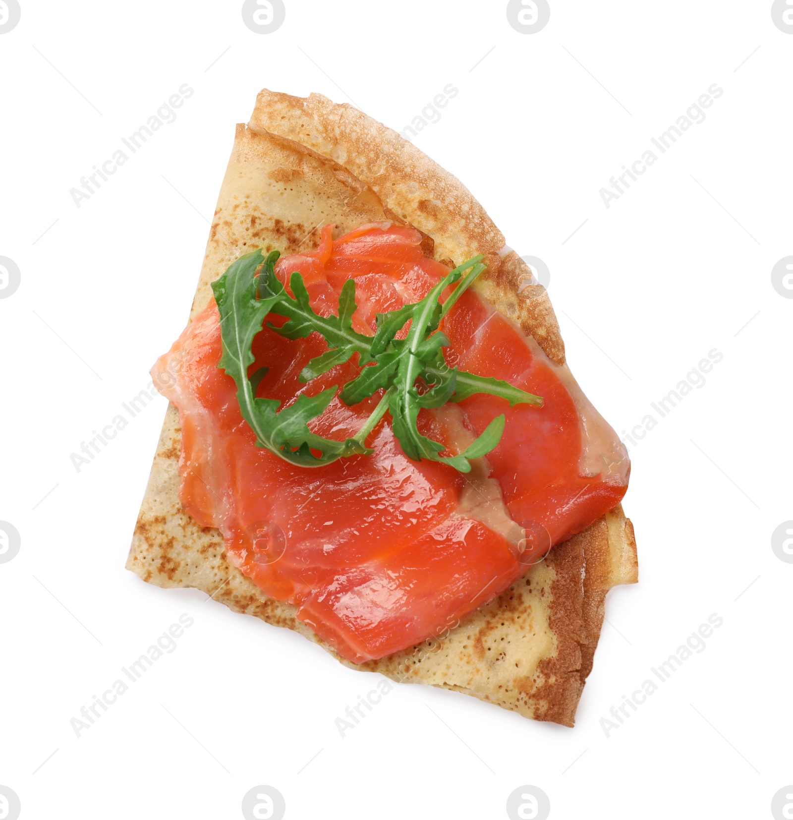 Photo of Delicious crepe with salmon and arugula isolated on white, top view