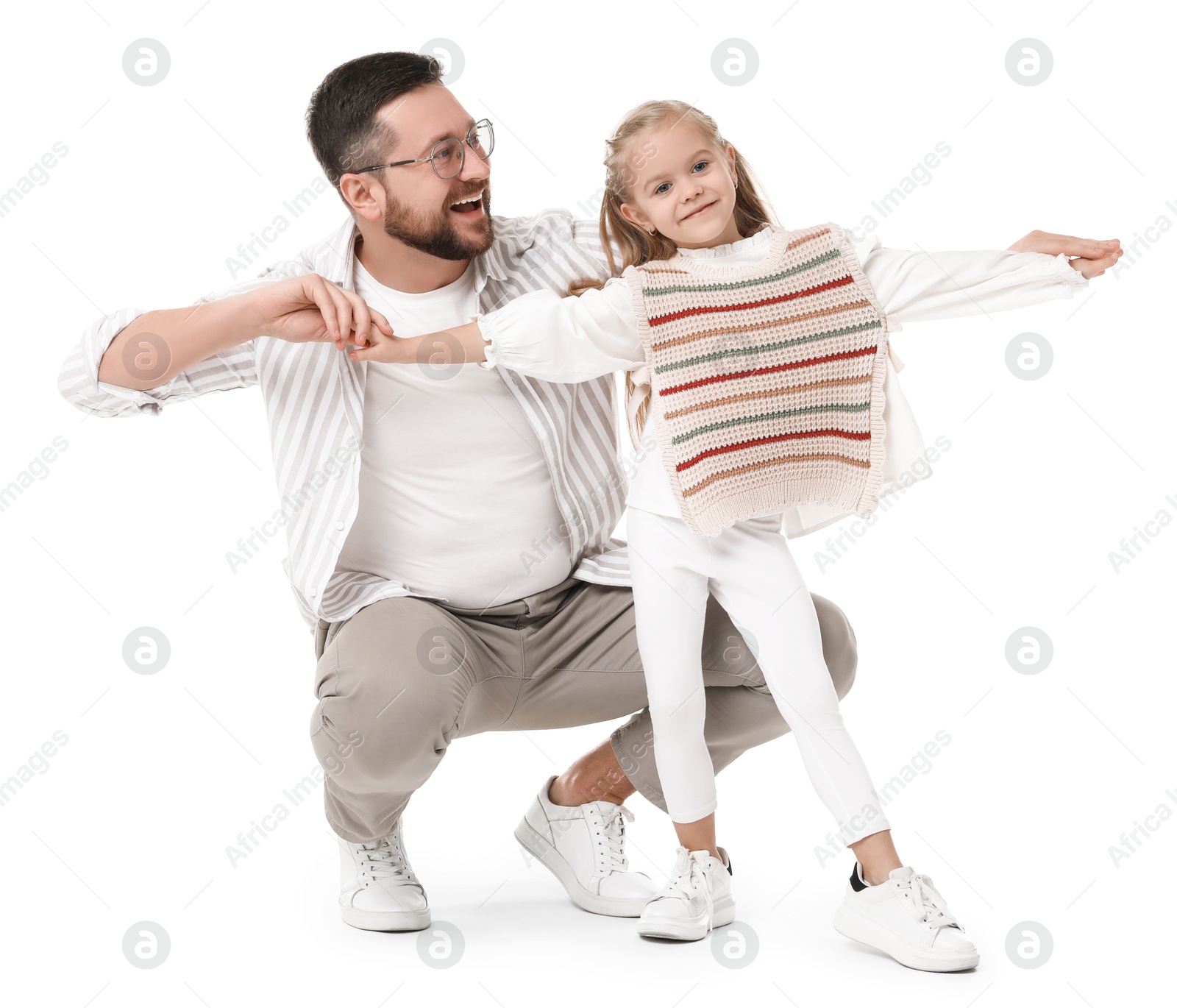 Photo of Happy father with his cute little daughter on white background