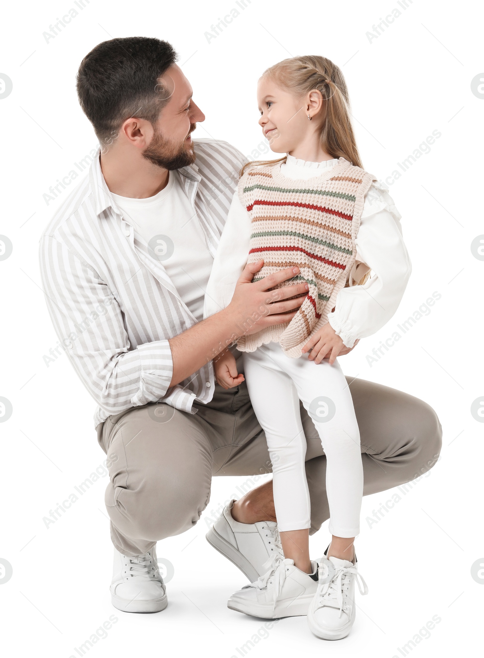 Photo of Happy father with his cute little daughter on white background