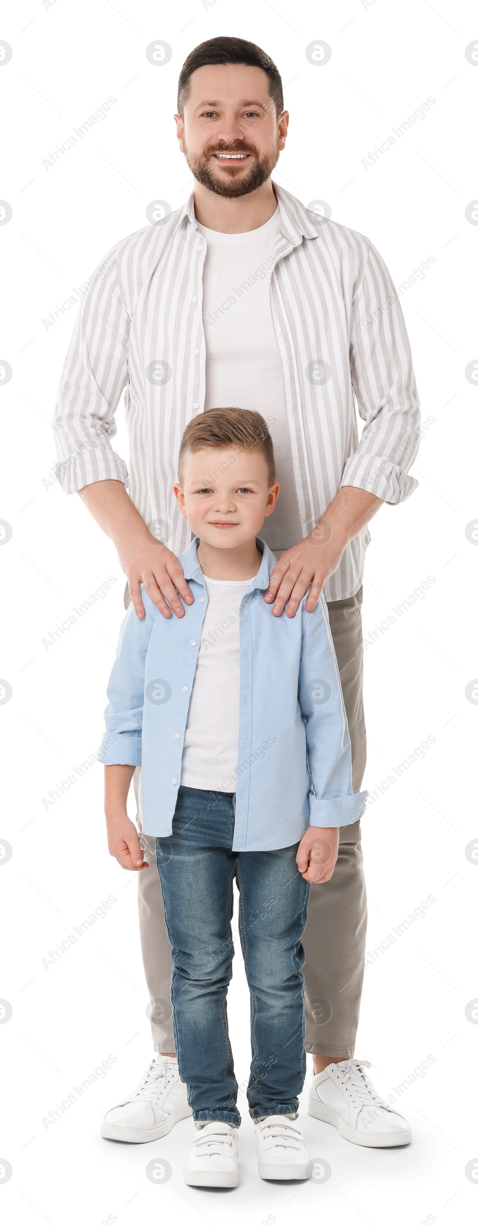 Photo of Happy father with his cute little son on white background