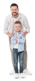 Photo of Happy father with his cute little son on white background