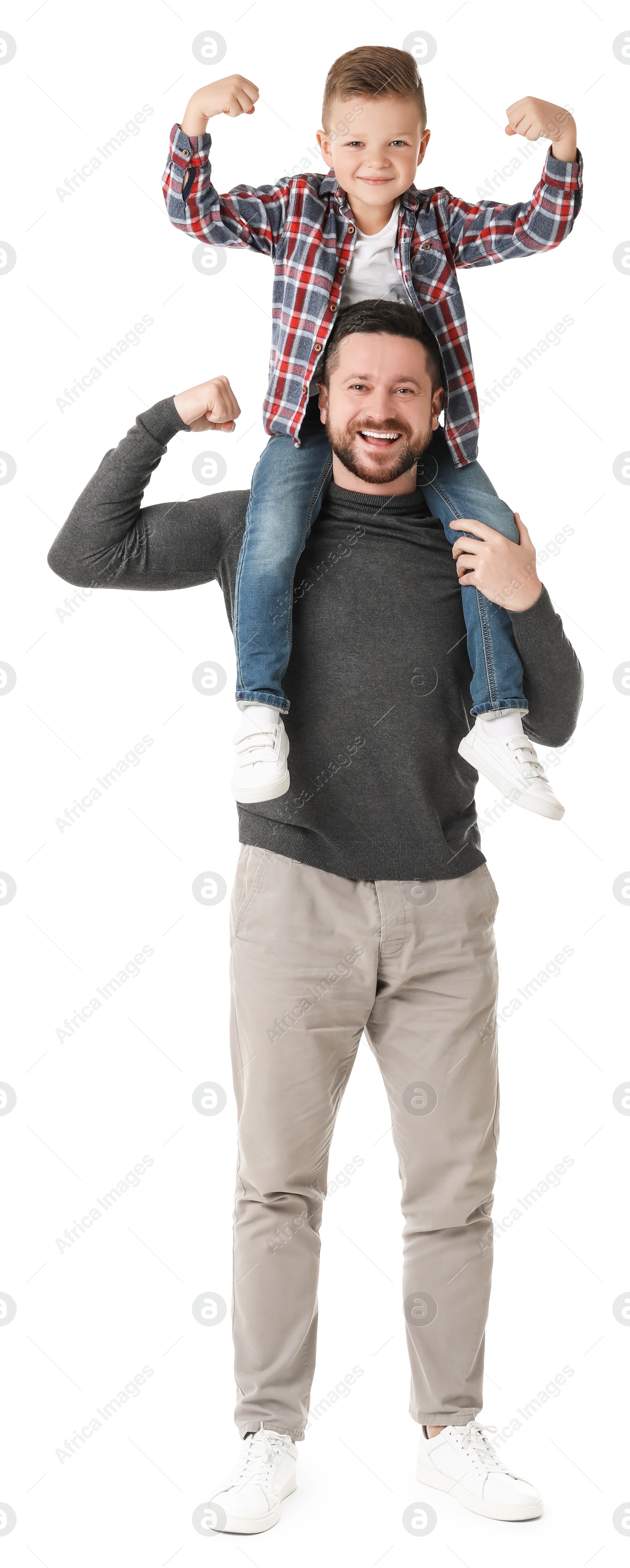 Photo of Happy father with his cute little son on white background