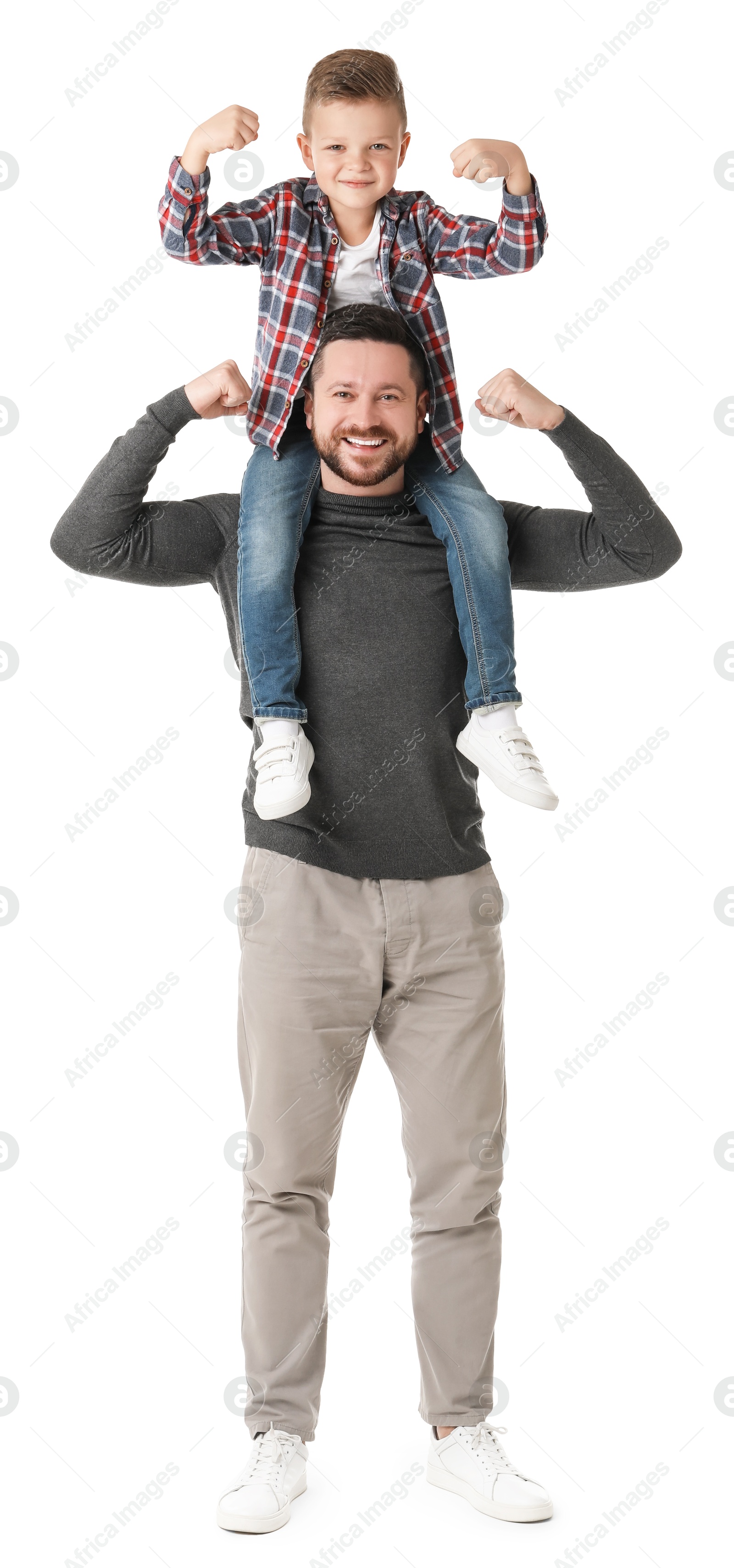 Photo of Happy father with his cute little son on white background