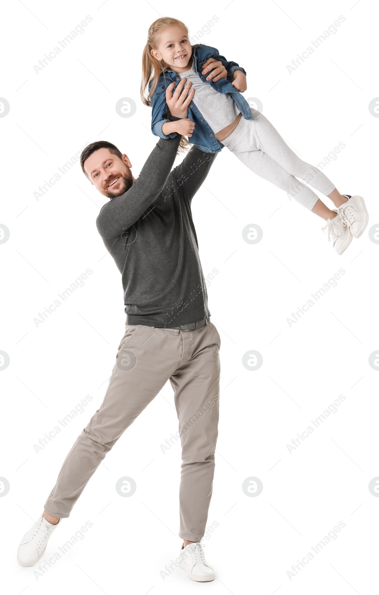 Photo of Happy father with his cute little daughter on white background