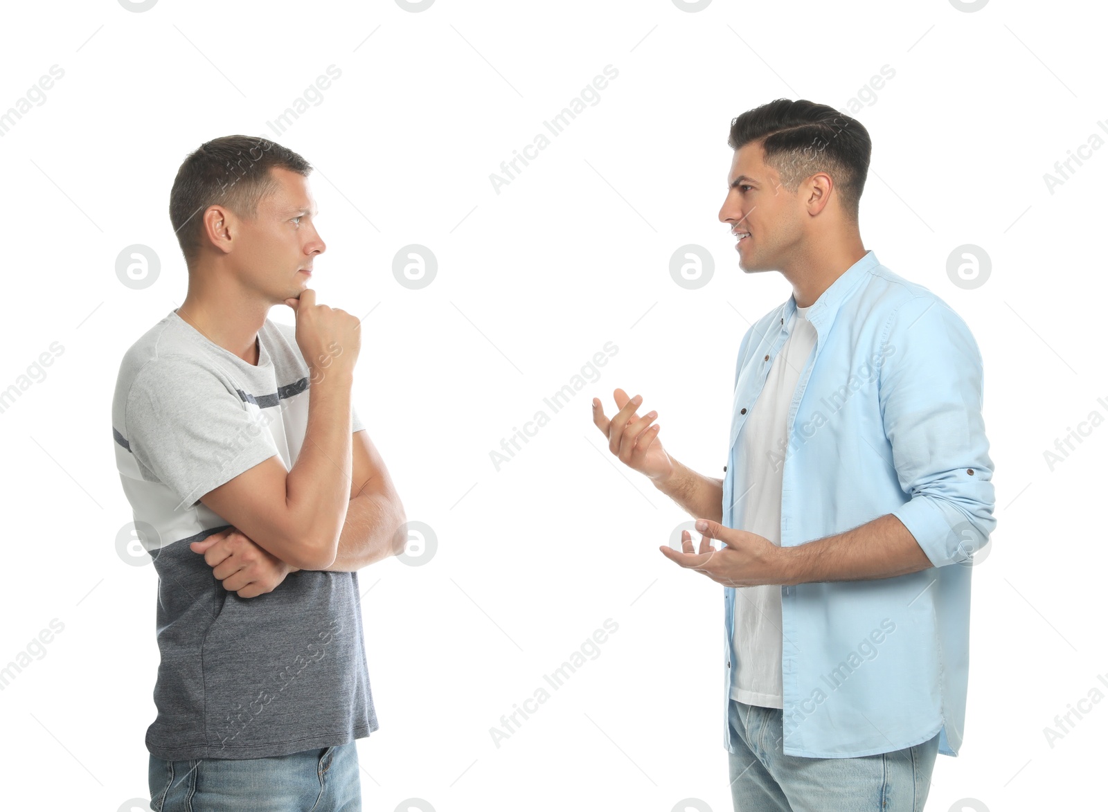 Photo of Men in casual clothes talking on white background