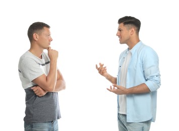 Photo of Men in casual clothes talking on white background