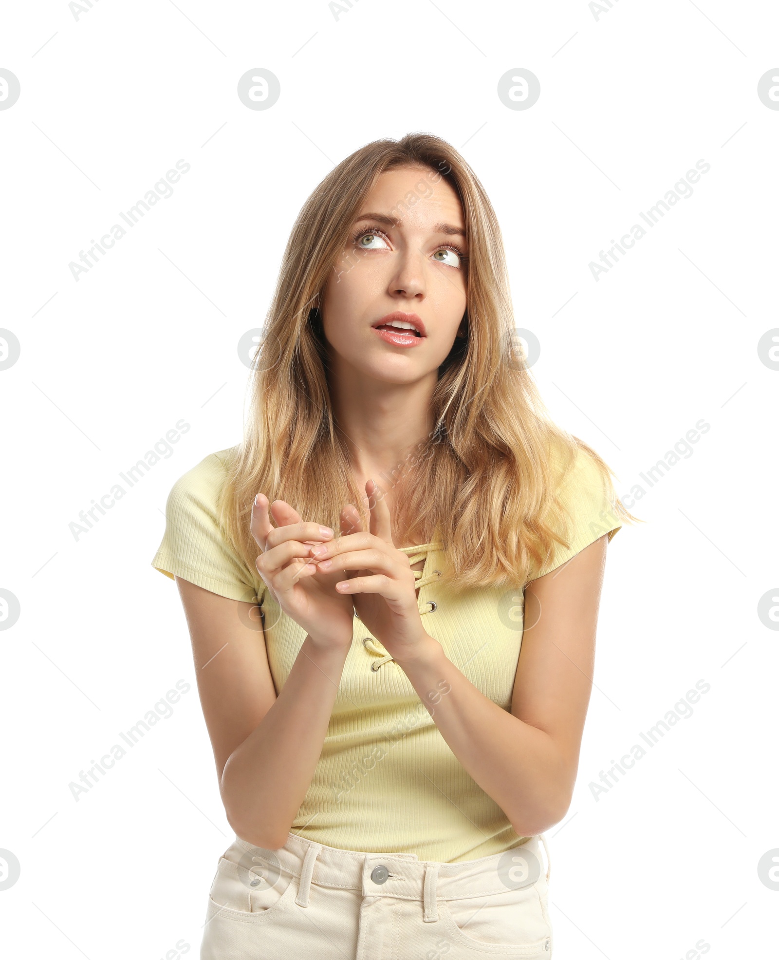 Photo of Thoughtful young woman talking on white background