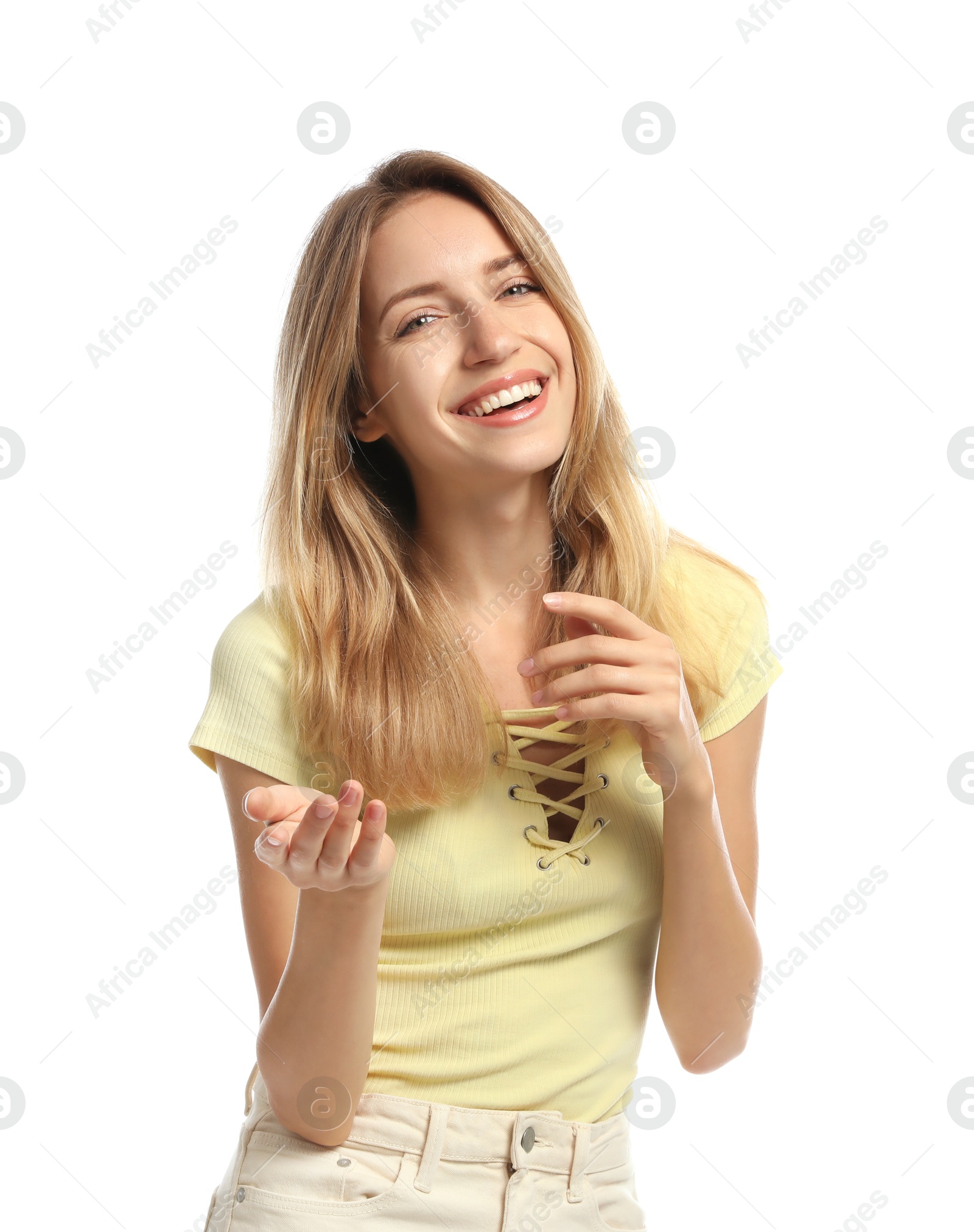 Photo of Young woman in casual clothes talking on white background