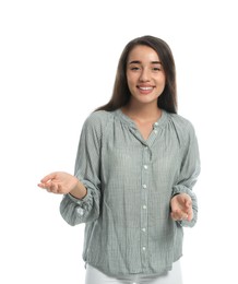 Photo of Young woman in casual clothes talking on white background