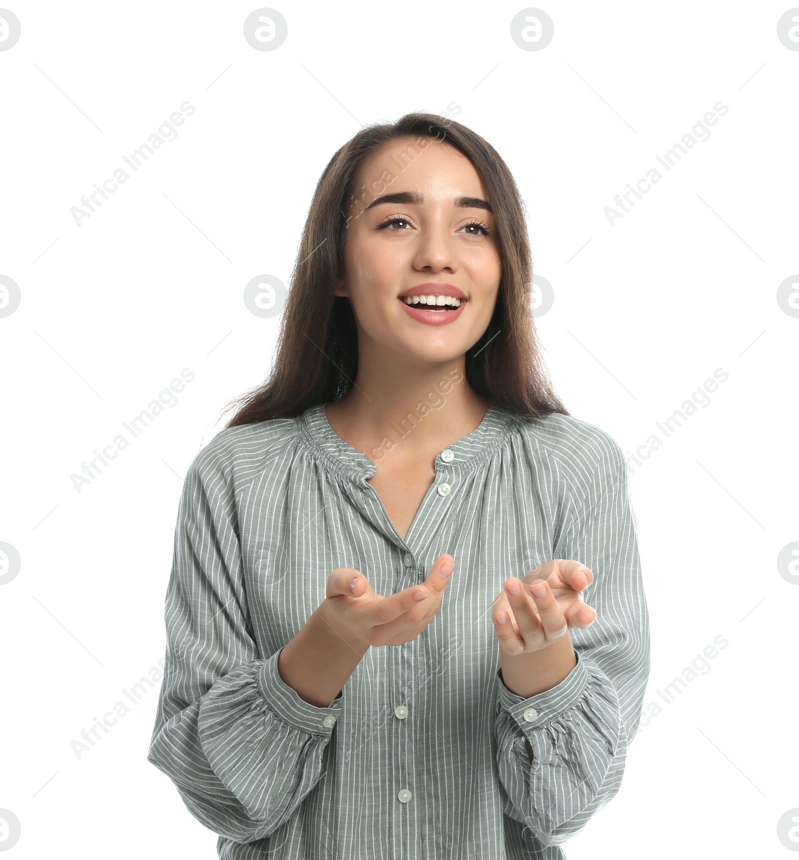 Photo of Young woman in casual clothes talking on white background