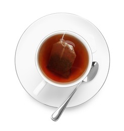 Photo of Tea bag in cup with hot drink isolated on white, top view