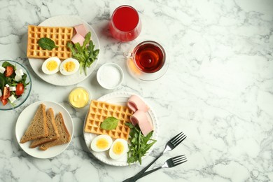 Photo of Flat lay composition with tasty brunch served on white marble table. Space for text