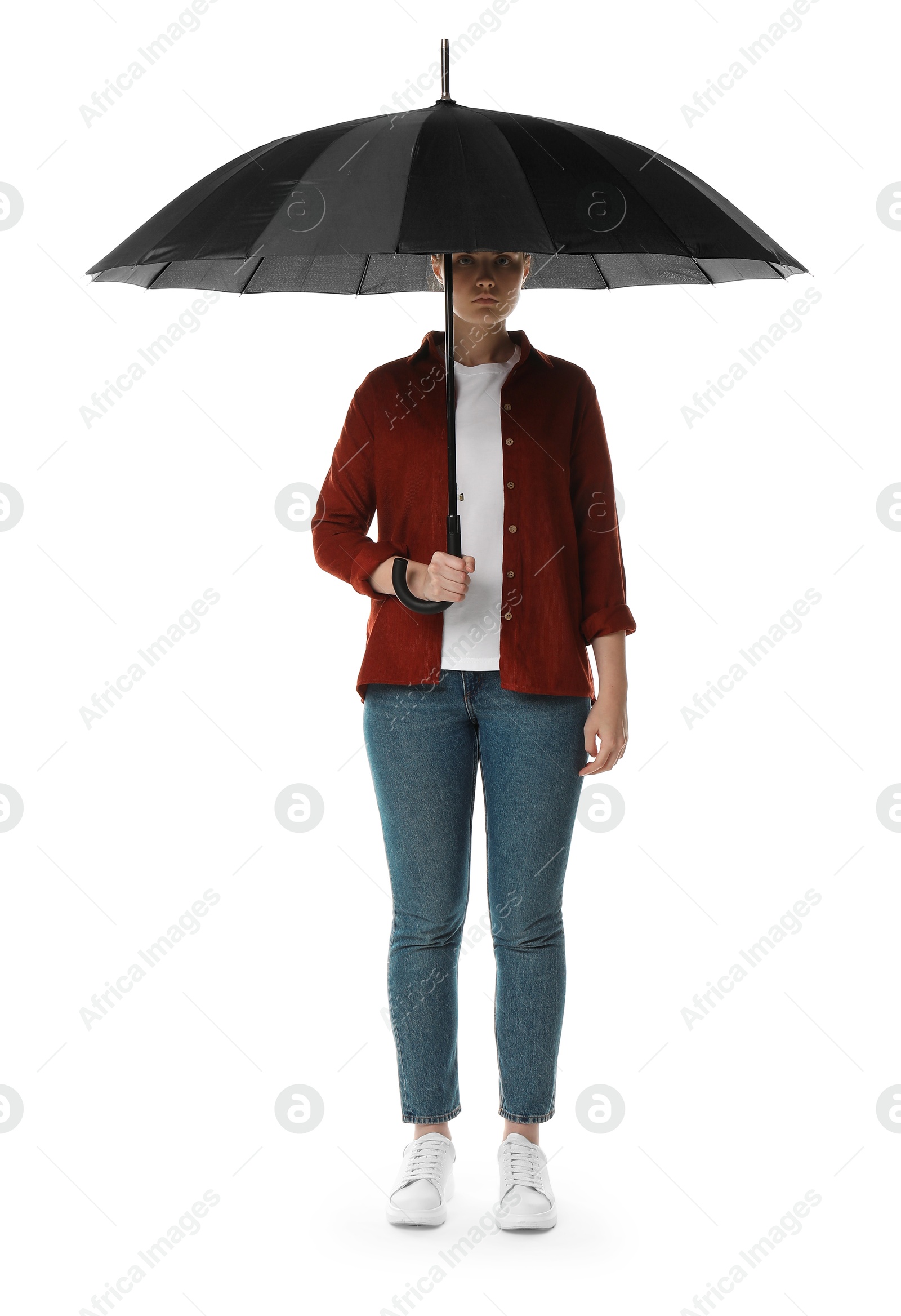 Photo of Young woman with black umbrella on white background