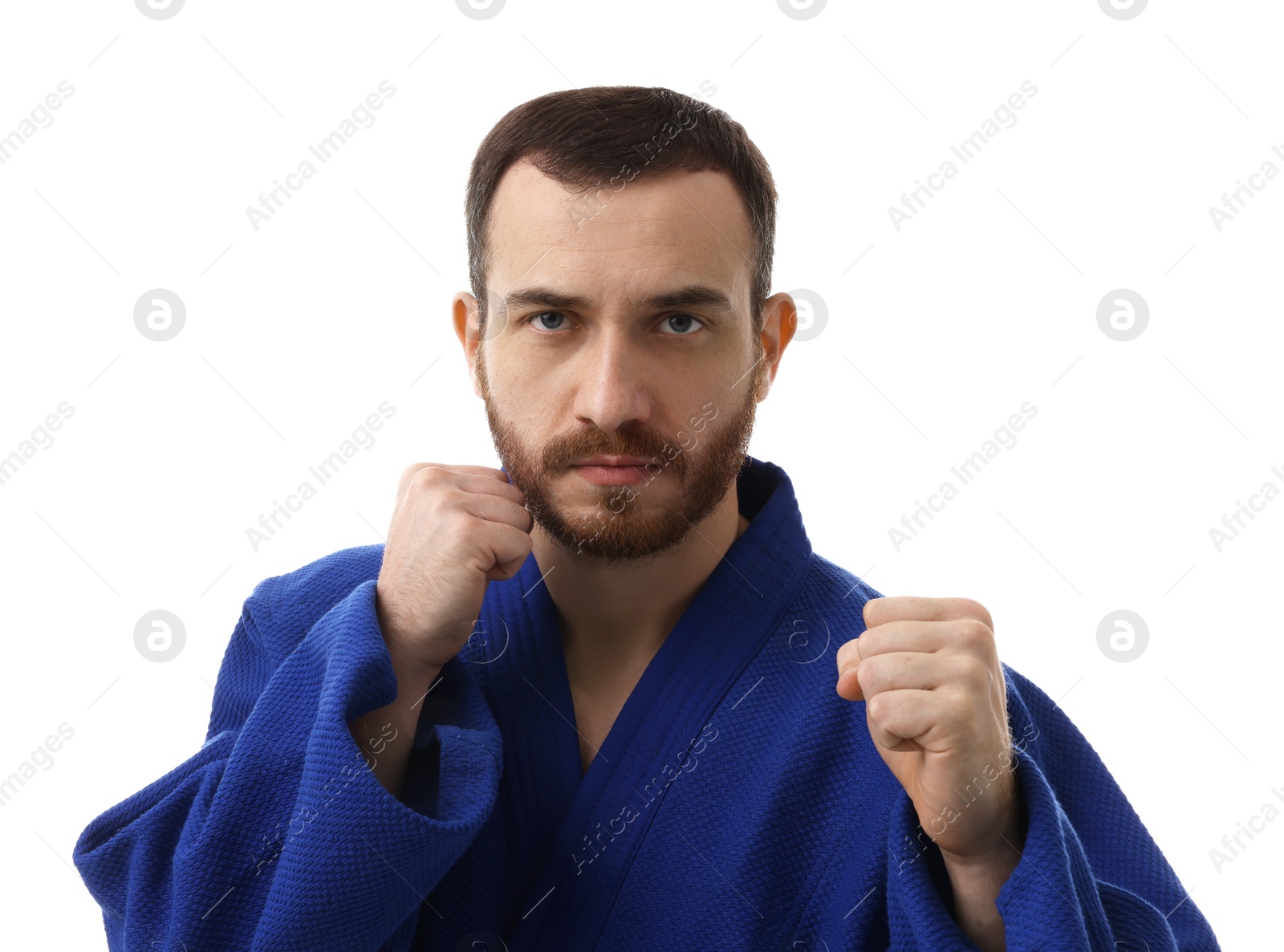 Photo of Karate fighter in uniform on white background