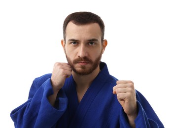 Photo of Karate fighter in uniform on white background