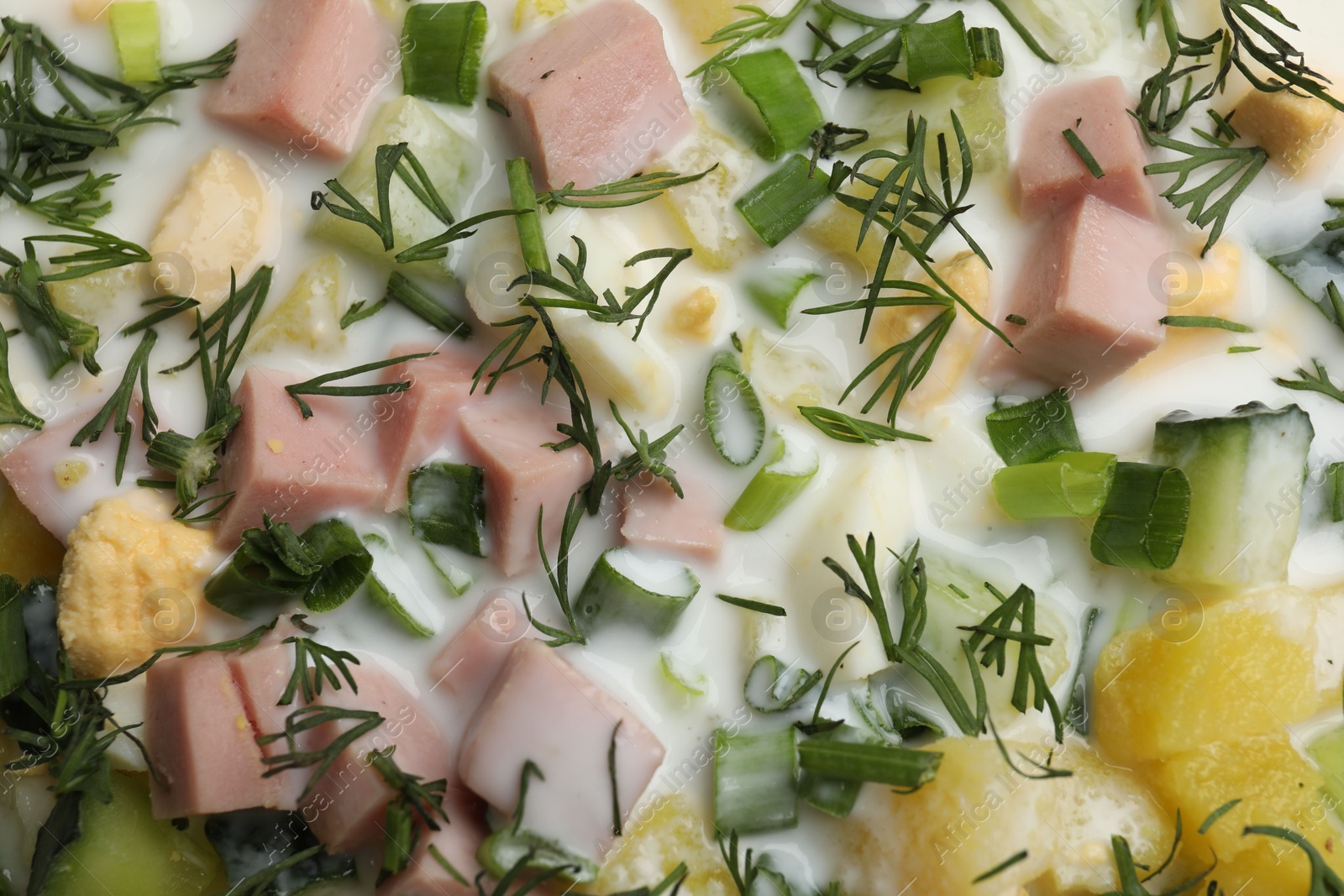 Photo of Delicious okroshka soup as background, top view