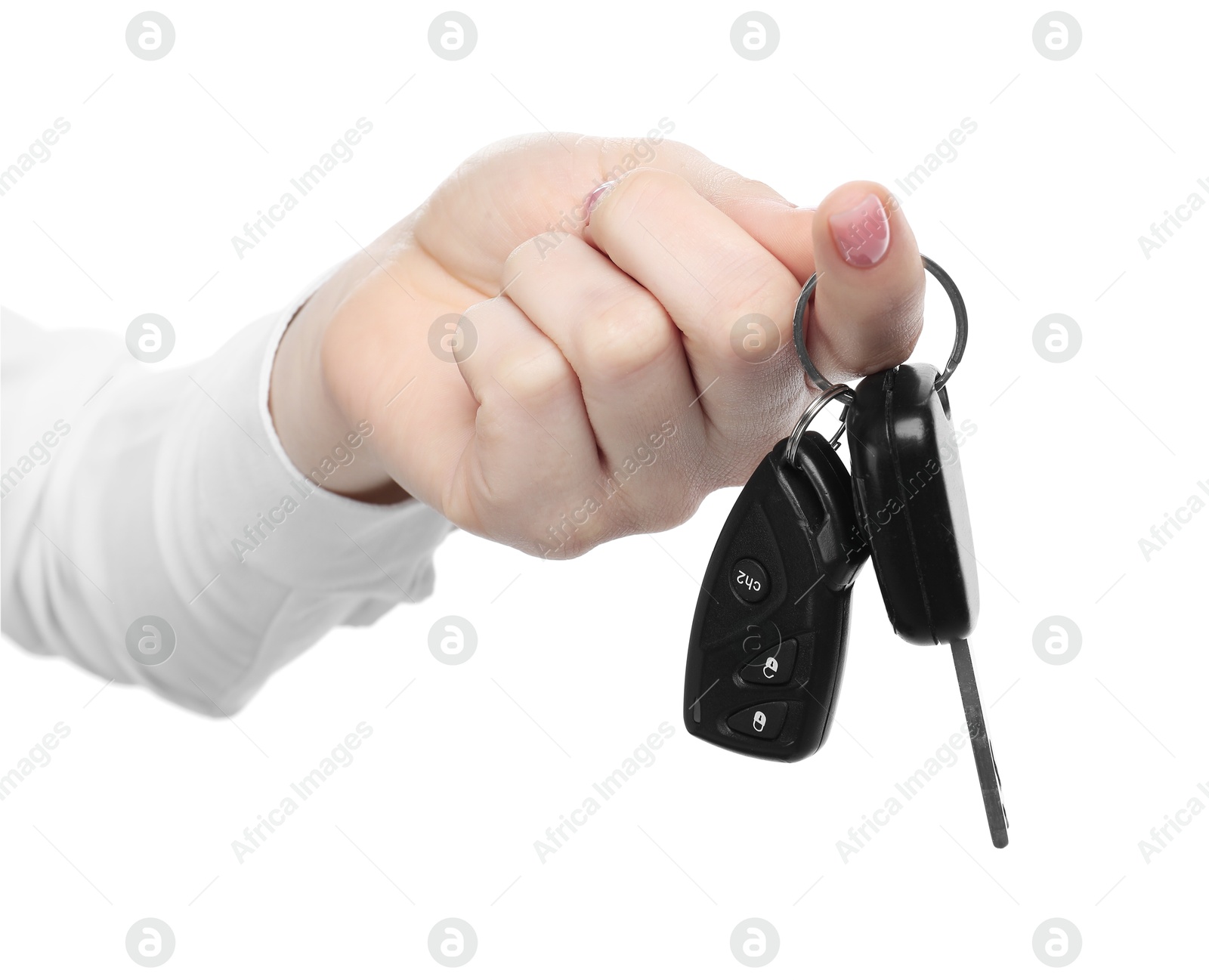 Photo of Woman with car keys on white background, closeup. Buying auto