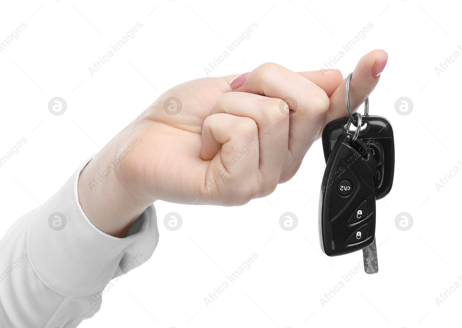 Photo of Woman with car keys on white background, closeup. Buying auto