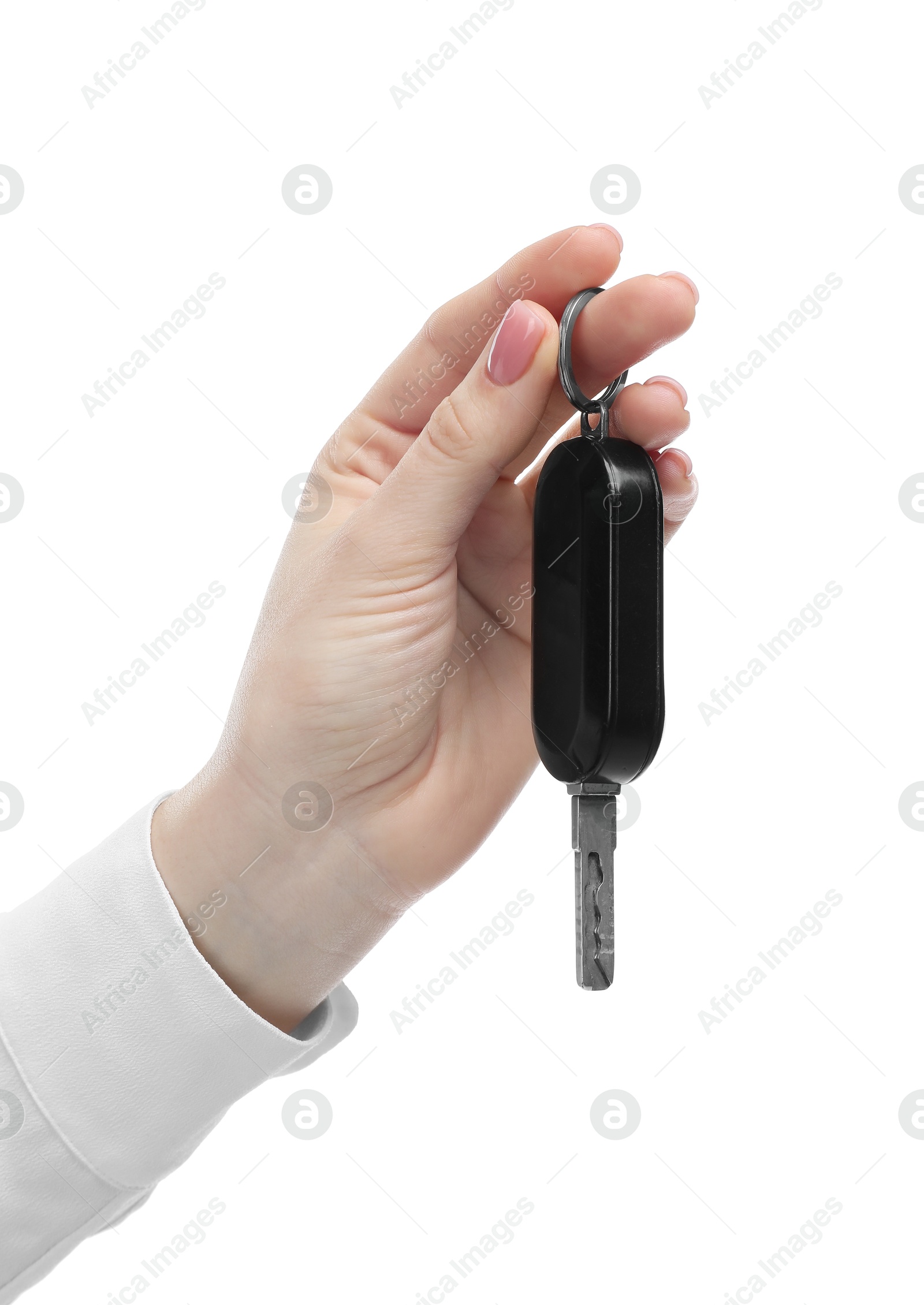 Photo of Woman with car key on white background, closeup. Buying auto