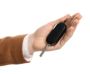 Photo of Woman with car key on white background, closeup. Buying auto