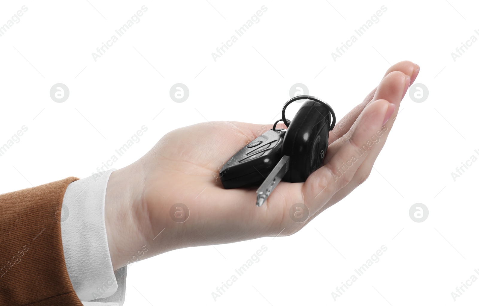 Photo of Woman with car keys on white background, closeup. Buying auto