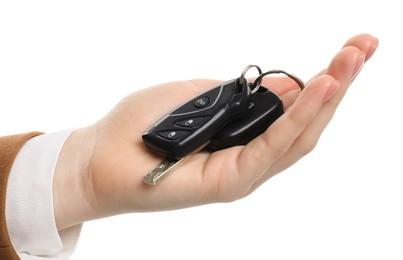 Photo of Woman with car keys on white background, closeup. Buying auto