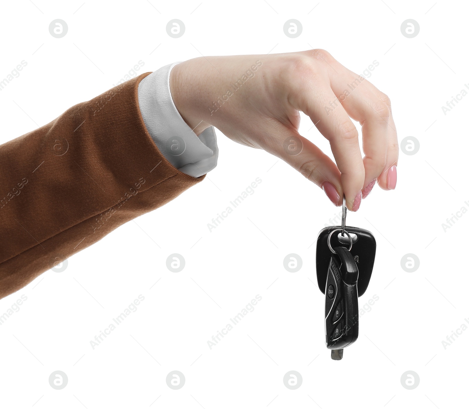 Photo of Woman with car keys on white background, closeup. Buying auto