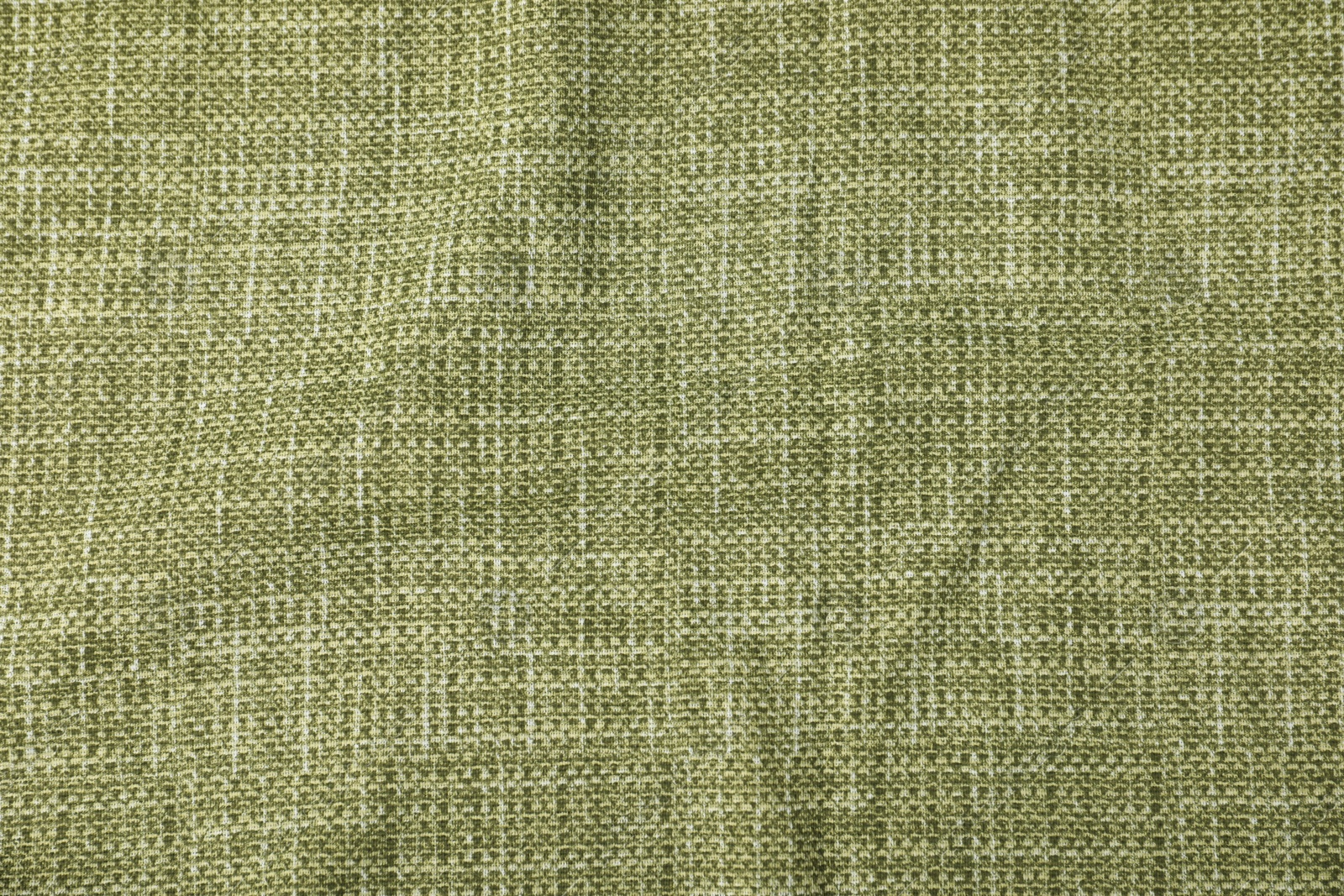 Photo of Texture of green tablecloth as background, top view