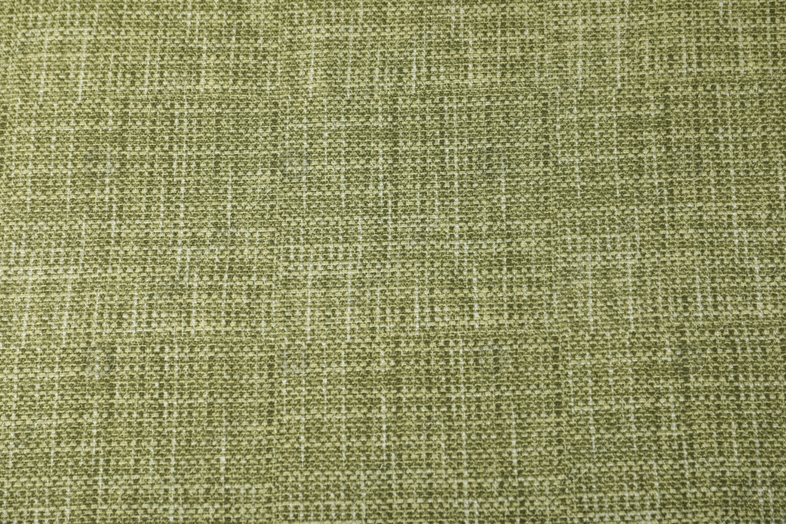 Photo of Texture of green tablecloth as background, top view