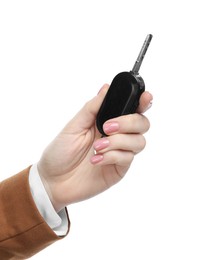 Photo of Woman with car key on white background, closeup. Buying auto