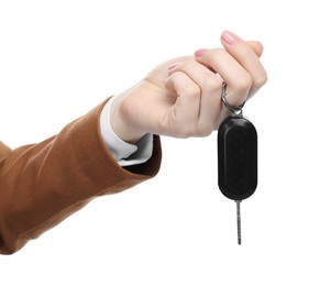 Photo of Woman with car key on white background, closeup. Buying auto