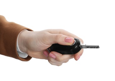 Photo of Woman with car key on white background, closeup. Buying auto