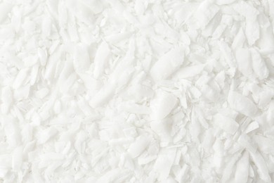 Photo of White soy wax flakes as background, closeup