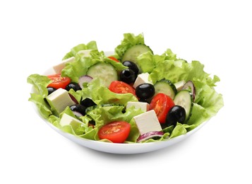 Photo of Delicious fresh Greek salad isolated on white