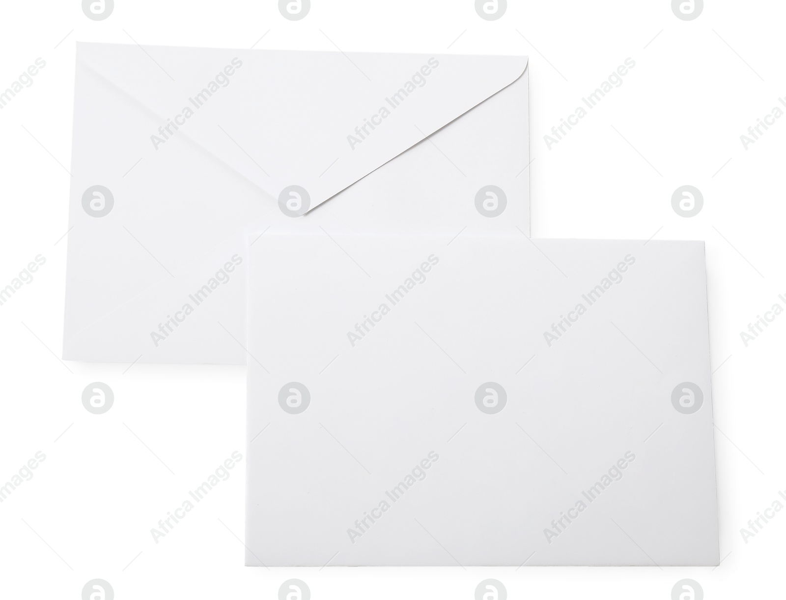 Photo of Envelopes isolated on white, top view. Mockup for design