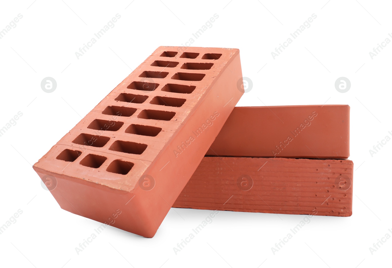 Photo of Red bricks isolated on white. Construction material