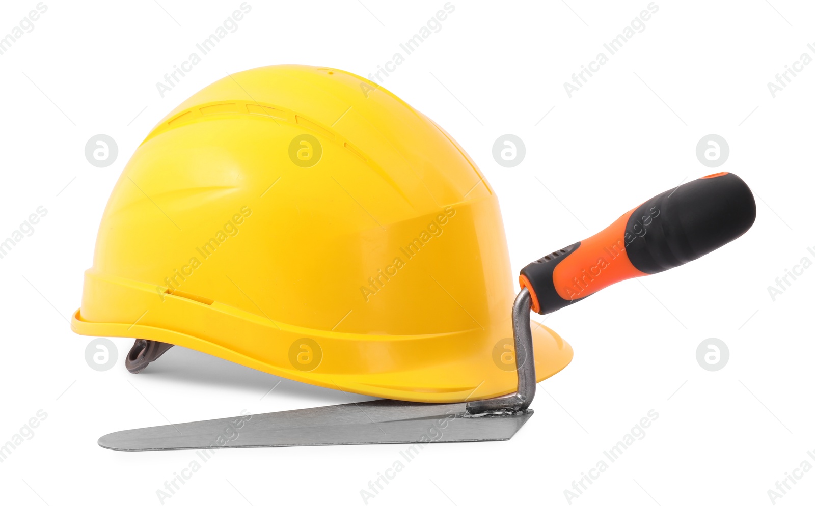 Photo of Hardhat and trowel isolated on white. Construction tool