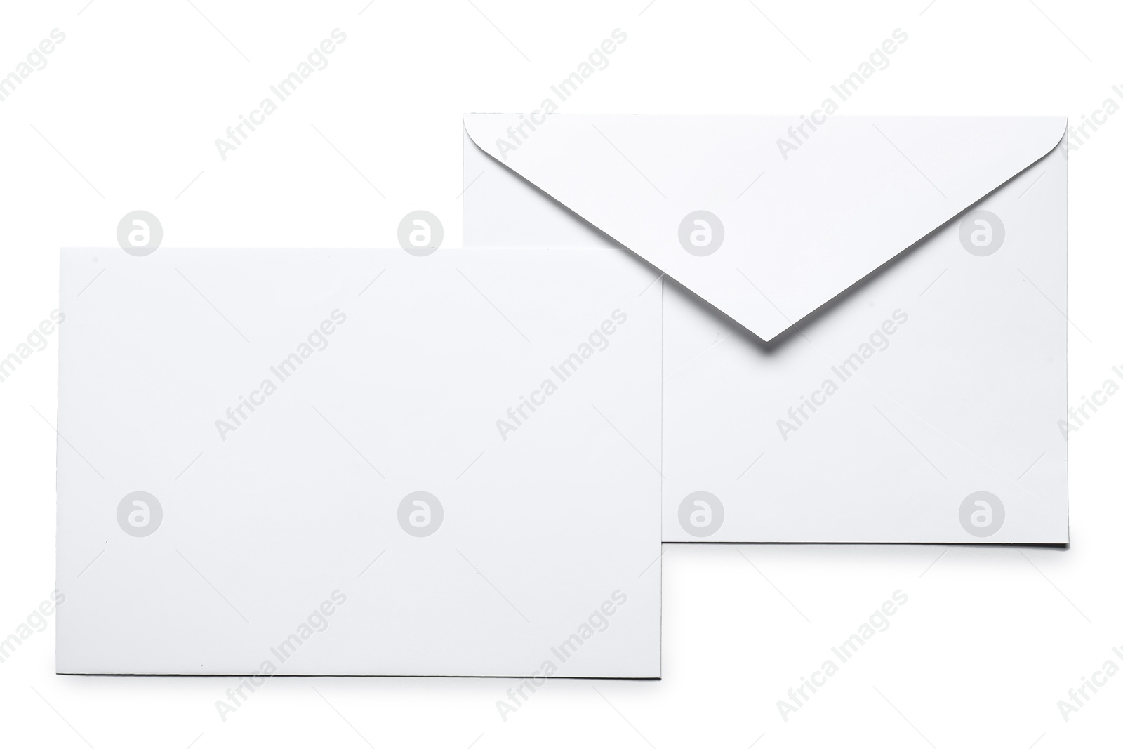 Photo of Envelopes isolated on white, top view. Mockup for design