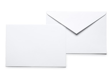 Photo of Envelopes isolated on white, top view. Mockup for design