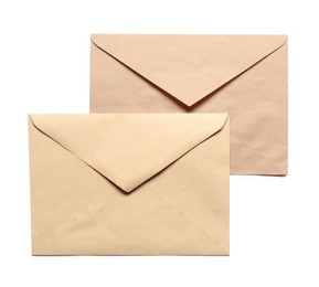 Photo of Envelopes isolated on white, top view. Mockup for design